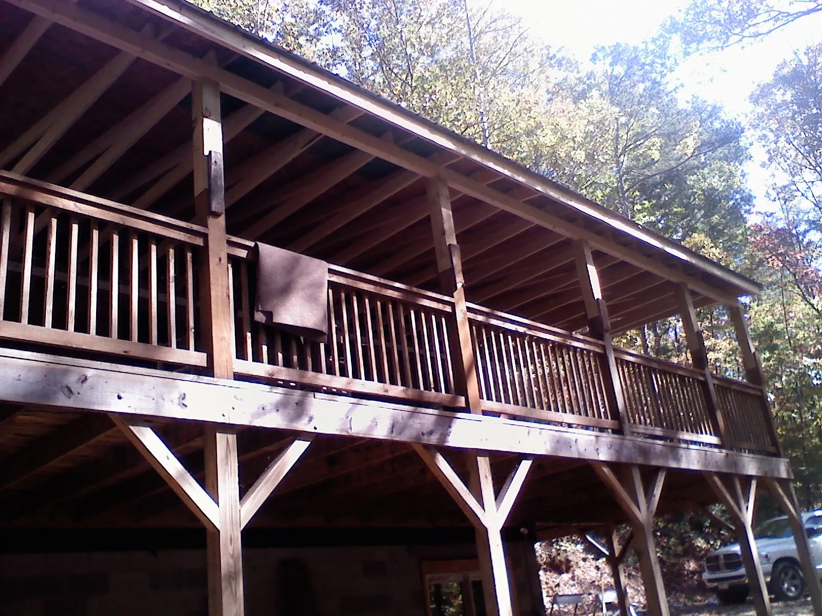 Timber framing under a new elevated porch and deck — Roof Leak Repair in Dobbs Ferry by Roofing Brothers